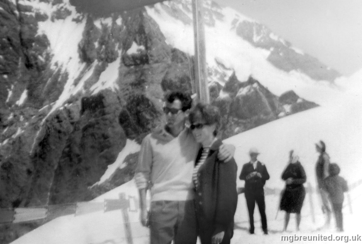 1963 Trip to Switzerland Mr Buckthorpe and Miss Moister. The Jungfraujoch mountain in the background..