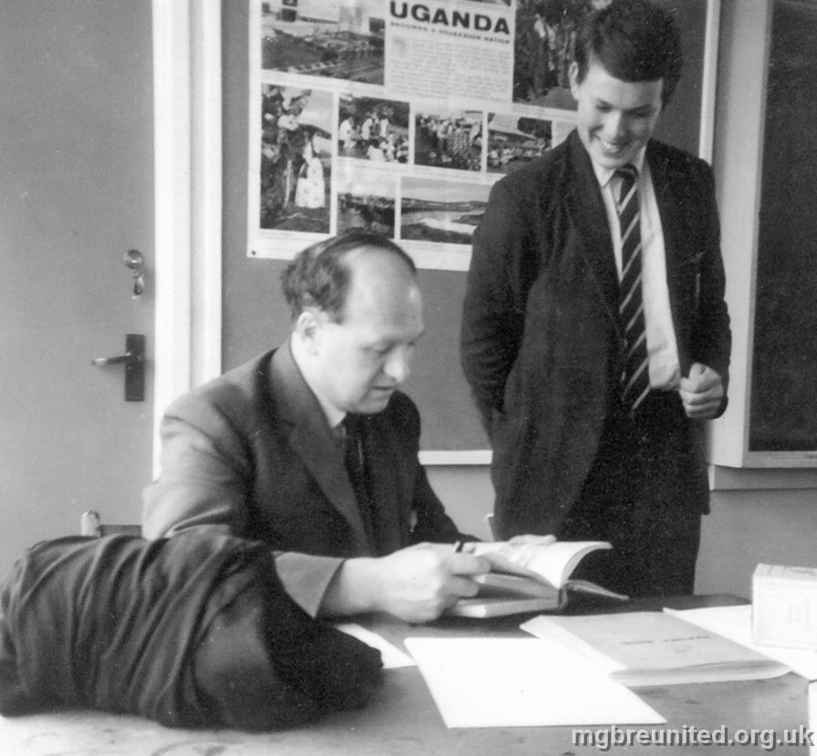 1963 MR PENFOLD WITH TREVOR VICKERS Interesting poster in the background - how life has changed!