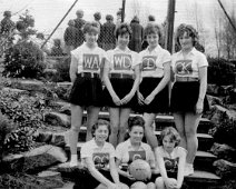 1962 04 Netball Team TOP ROW: Susan De-Barr, Hilary Hulme, Norma Drew, Carole Eggleton. FRONT ROW: Carole Smith, Anita Hopewell, Judith Taylor. Location: Netball courts MGB. April...